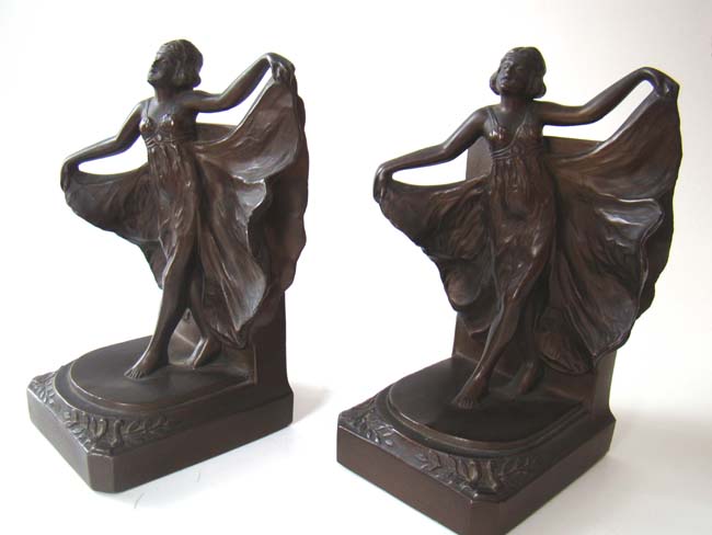 A gorgeous pair of ART DECO bookends depicting 'Loie' circa 1927
